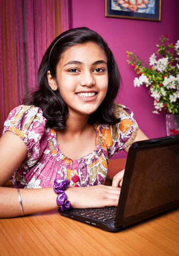 Education-Quizzes-Girl-Using-Laptop