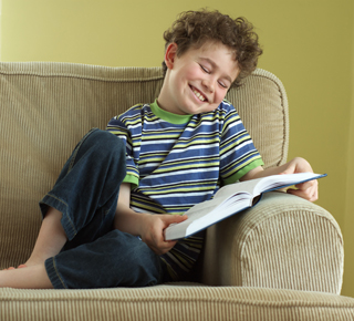 KS1 Vocabulary Illustration – Young Boy Reading
