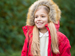 Child wearing furry hooded coat