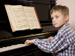 Child playing the piano