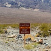 Caution Sign Warning Of Heat At Death Valley