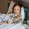 Child Sick In Bed